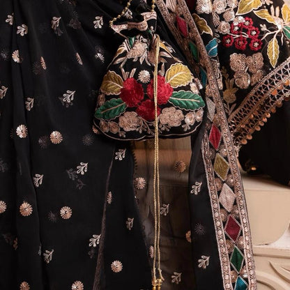 MAHNAAZ- Haseens official ( ORIGINAL)…4 pieces heavy embroidered chiffon suit with matching potli bag