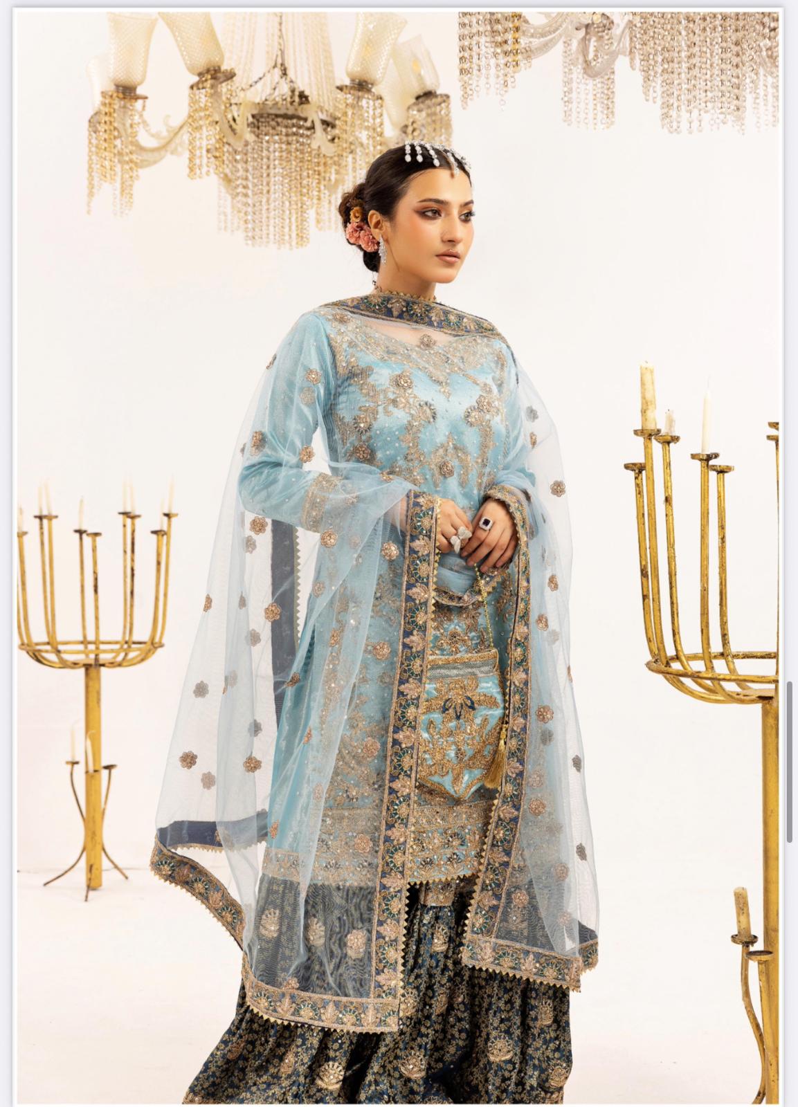 Farshi by SIMRANS- 4 pcs heavy embroidered gharara suit with matching potli bag- small to XL